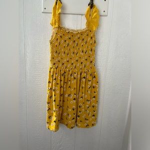 Yellow sundress with flowers